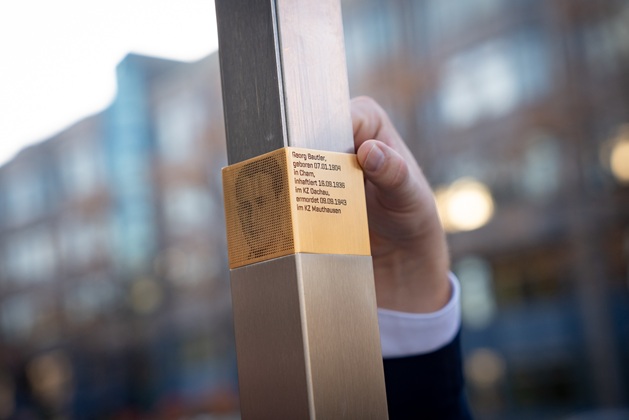 The Memorial Sign for Georg Bautler is installed