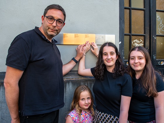 Relatives with the Memorial Sign for Klara Steinberg