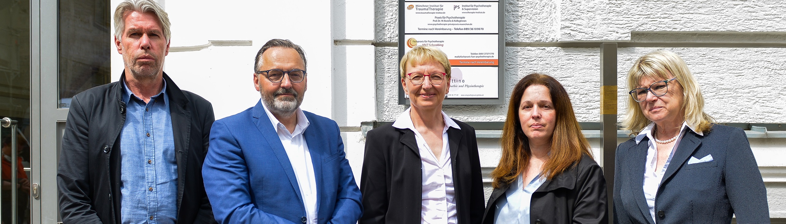 Guests in front of the Memorial Signs for Lysiane Robinet and André Coulaud