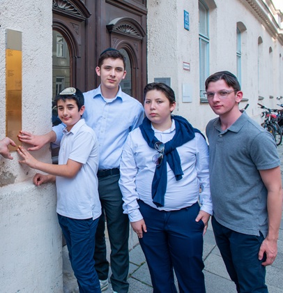 Relatives with the Memorial Sign for Klara Krippel