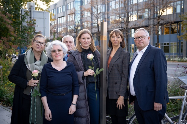 Group picture with the Memorial Sign for Georg Bautler