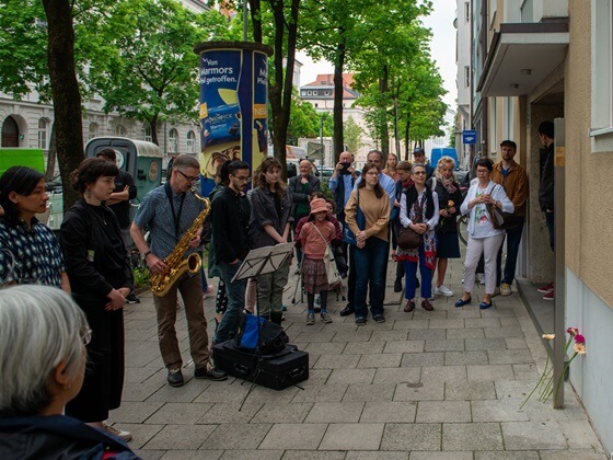 Peter Herrmann plays the saxophone at the commemoration