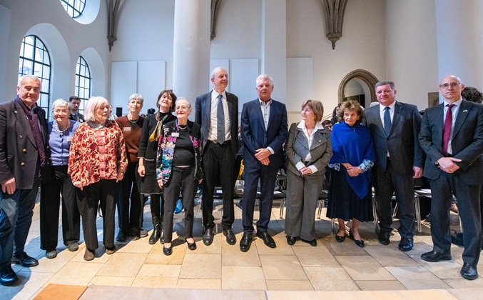 Guests and speakers at the commemorative event