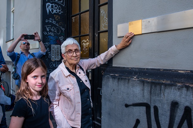Relatives with the Memorial Sign for Necha Schindler