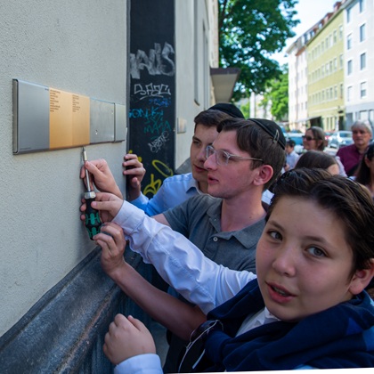 Relatives installing Memorial Signs